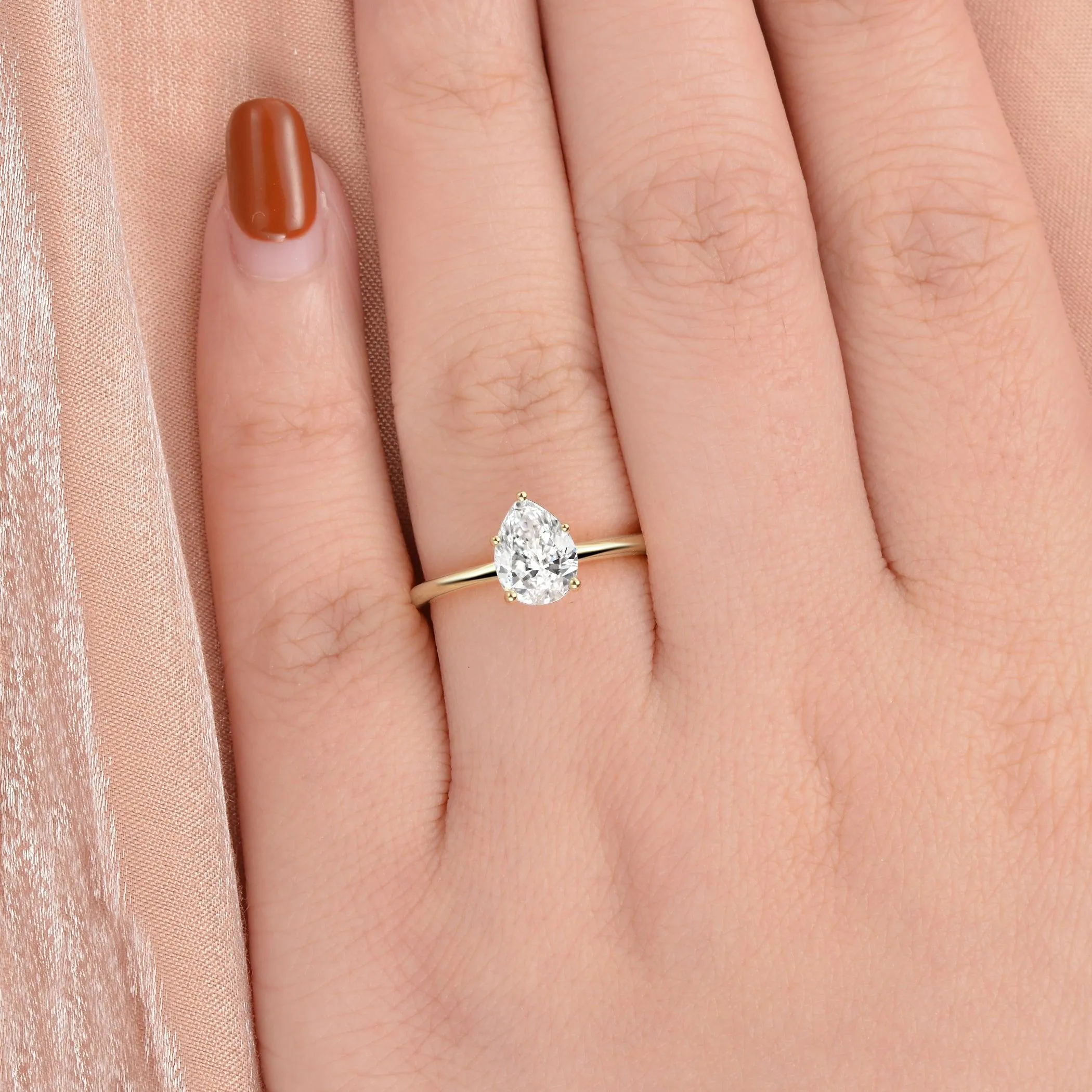 1.0ct Pear Shaped Moissanite Classic Solitaire Ring