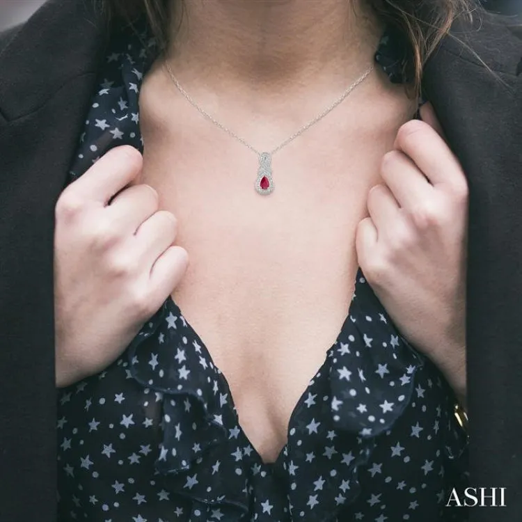 6x4 MM Pear Shape Ruby and 1/50 Ctw Round Cut Diamond Pendant in Sterling Silver with Chain