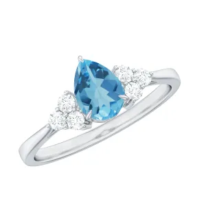 Claw Set Pear Cut Sky Blue Topaz Solitaire Ring with Diamond Trio