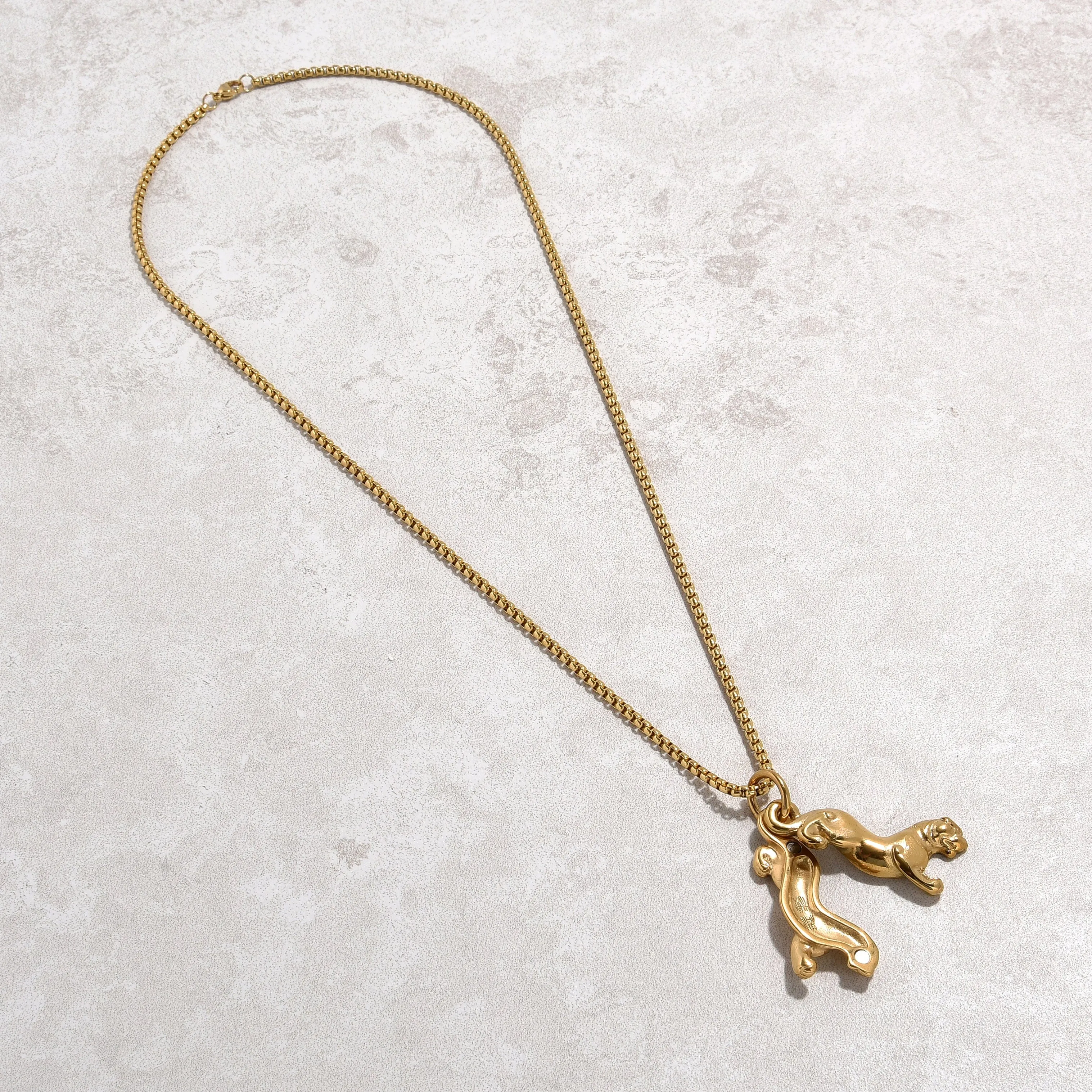 Gold Jaguar Steel Hearts Necklace