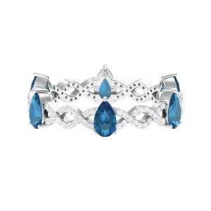 London Blue Topaz and Diamond Eternity Ring with Crossover Shank