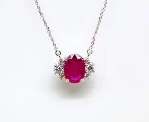 Oval Ruby And Diamond Pendant In 14k White Gold